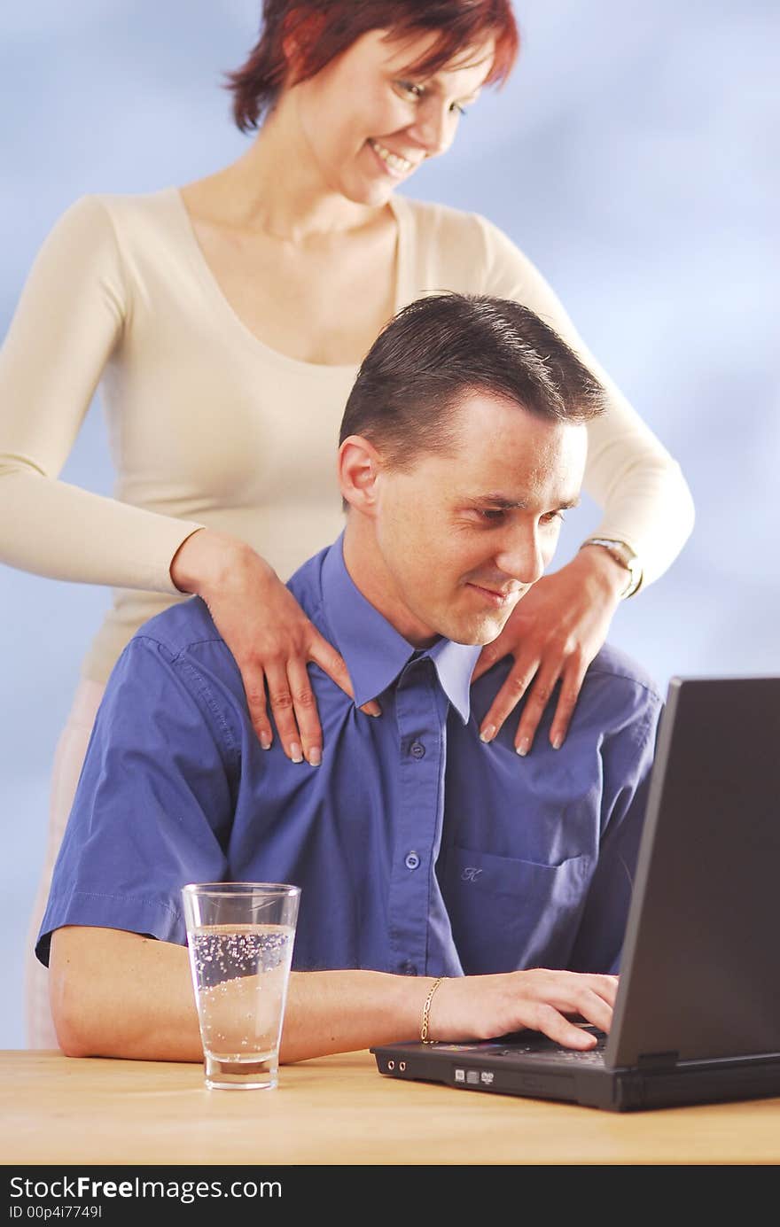 A woman massages her boyfriend. A woman massages her boyfriend