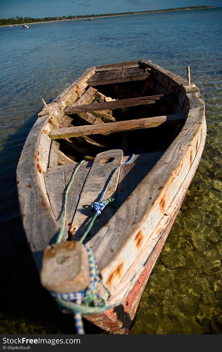 Inside a red dhow or traditional wooden boat on the islands. See the rest in this series. Inside a red dhow or traditional wooden boat on the islands. See the rest in this series.