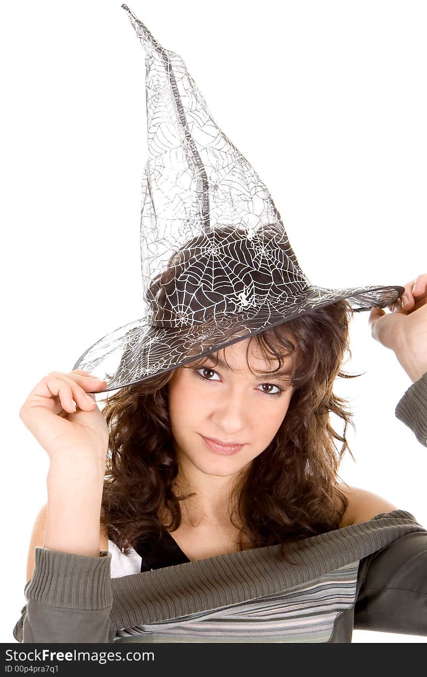 Beautiful young woman wearing santas hat on white background