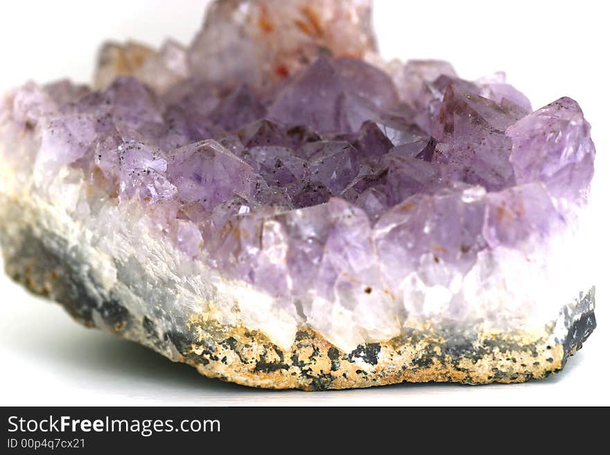 Purple and white crystal, isolated. Purple and white crystal, isolated