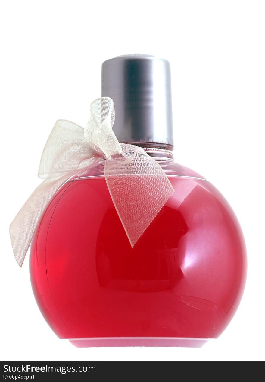 Red cosmetic in a flask with ribbon. Red cosmetic in a flask with ribbon