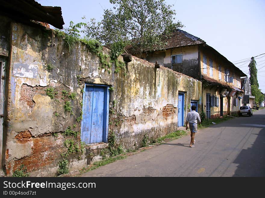 Man walking along empty street. Man walking along empty street