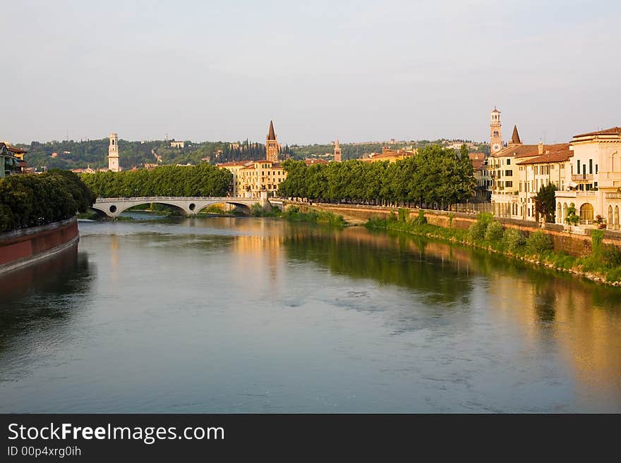 Verona, northern Italy. View of city and river in evening sunlight. Verona, northern Italy. View of city and river in evening sunlight.