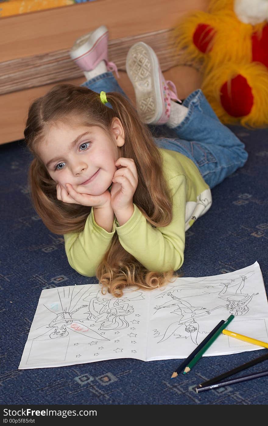 A young girl in her room. A young girl in her room