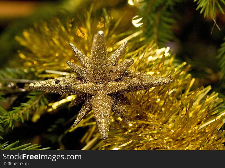 Golden New-Year tree decoration very close-up