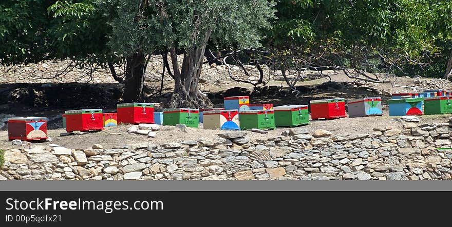 A Row of colourful bee Hives in Thassos, Greece