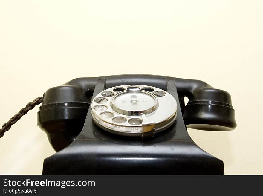 Old Fashioned telephone against white backdrop