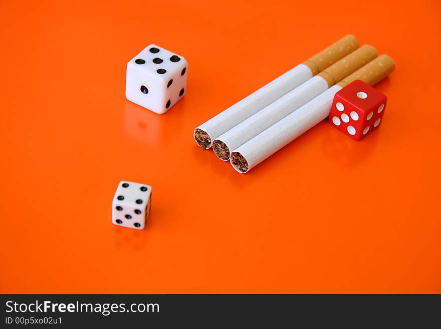 Cigarettes and dice, a gamble with your life. Cigarettes and dice, a gamble with your life