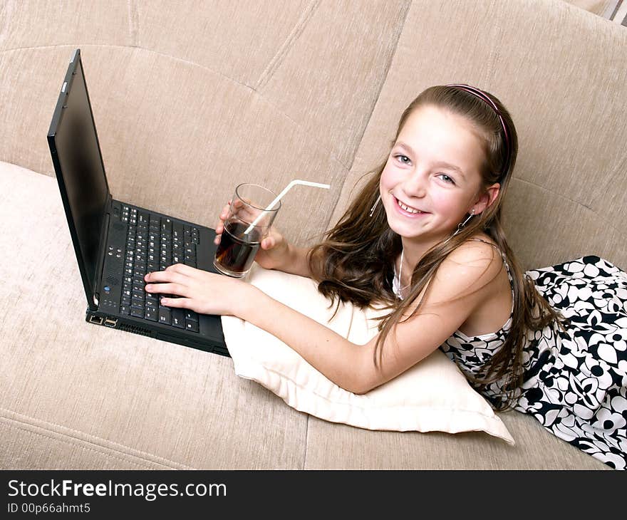 Young girl using a laptop.