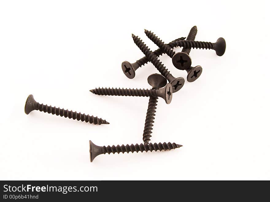 Black screws isolated on a white background