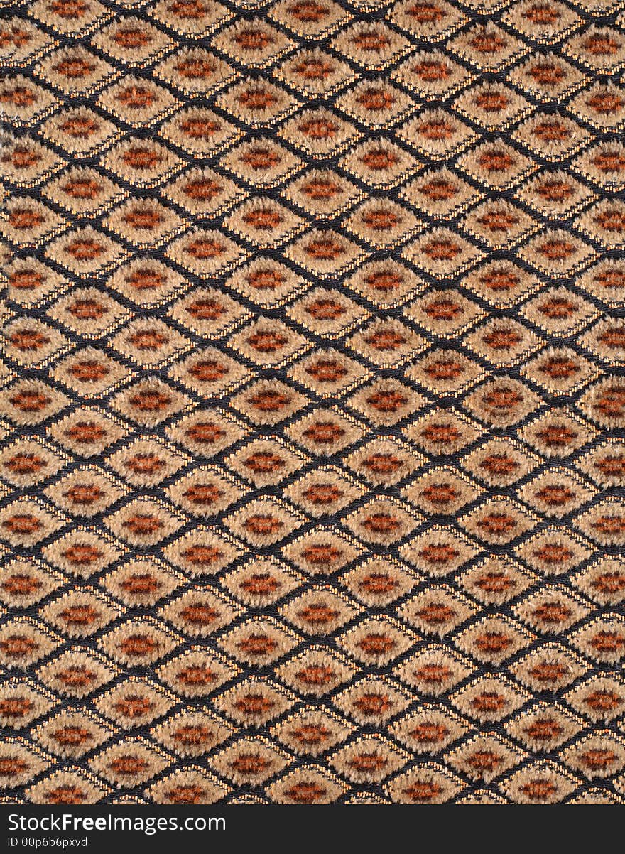 Brown fabric material texture with rhombs. Brown fabric material texture with rhombs