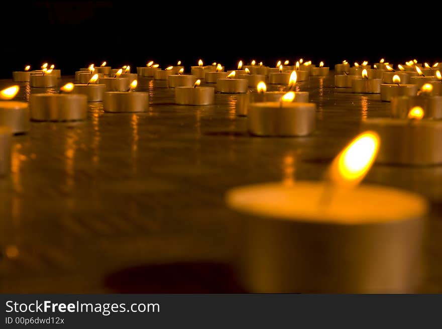 Close up view of the candles in the darkness