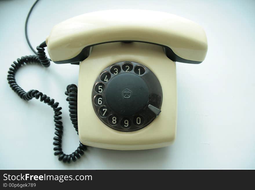 Ancient phone on a white background. Ancient phone on a white background