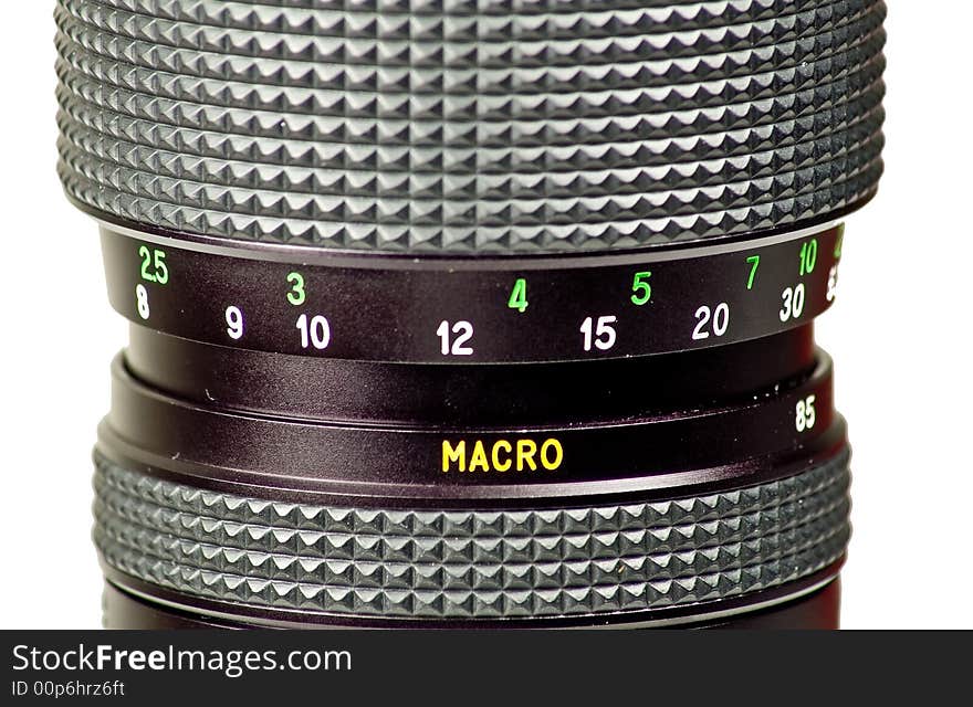 Image of a black macro camera lens isolated on white