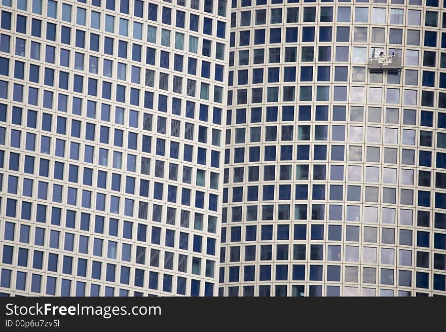 Window Cleaners On A Skyscraper