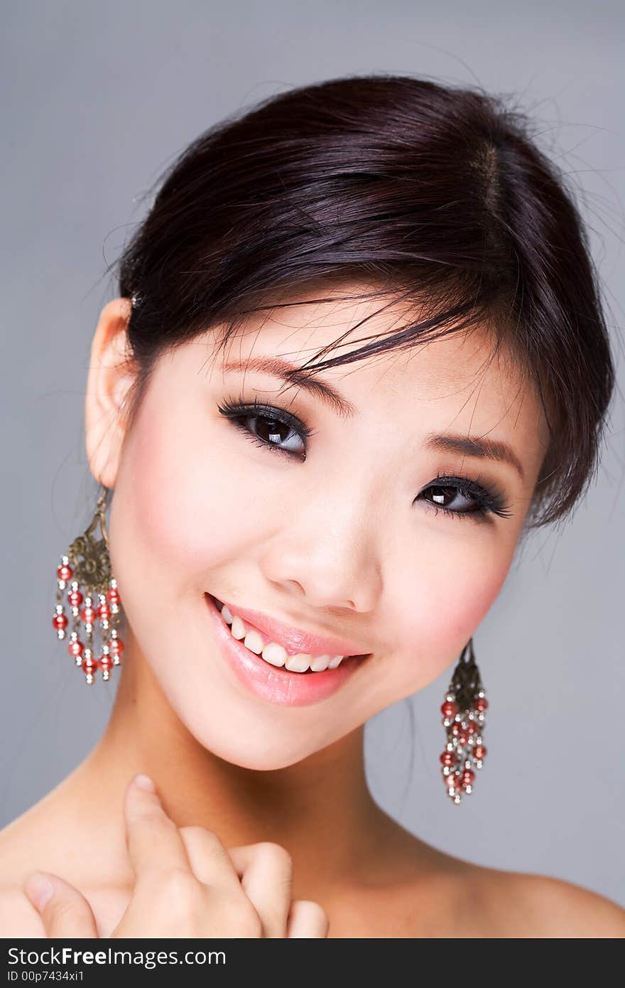 Beautiful asian woman with a sensual smile. Beautiful asian woman with a sensual smile