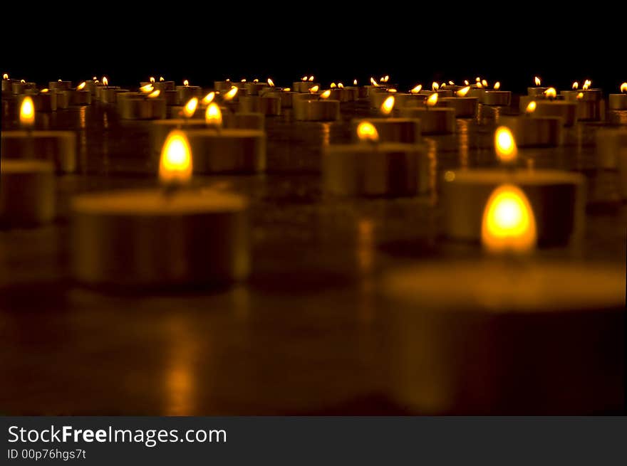 Close up view of the candles in the darkness