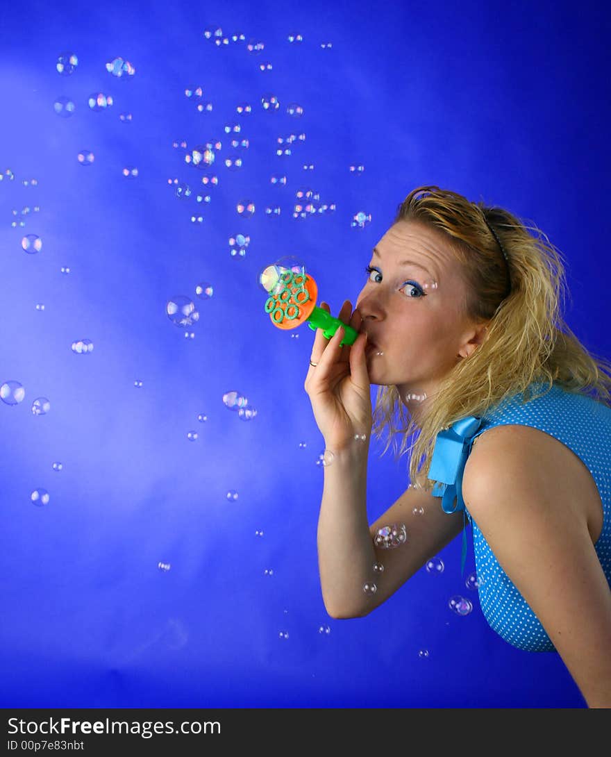 Beautiful blond girl with soap bubbles. Beautiful blond girl with soap bubbles