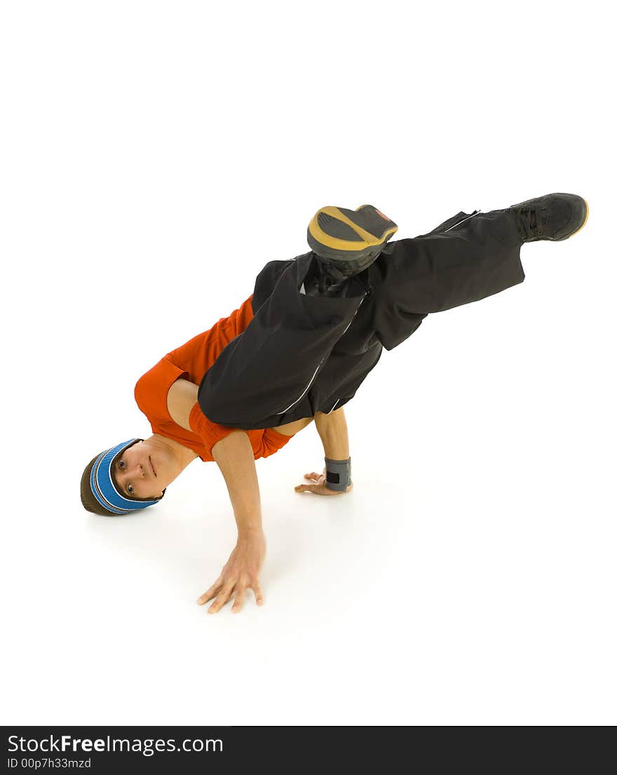 Young bboy holding up on hands and head. Holding legs in air. Looking at camera. Isolated on white in studio. Front view, whole body. Young bboy holding up on hands and head. Holding legs in air. Looking at camera. Isolated on white in studio. Front view, whole body