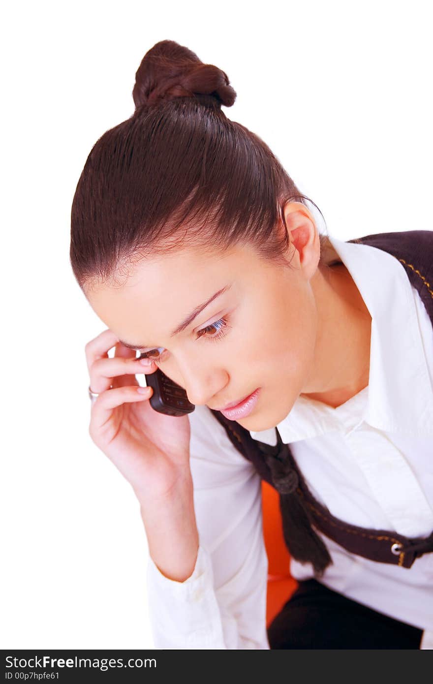 Female businesswoman making phone call, sitting on a chair. isolated on white background