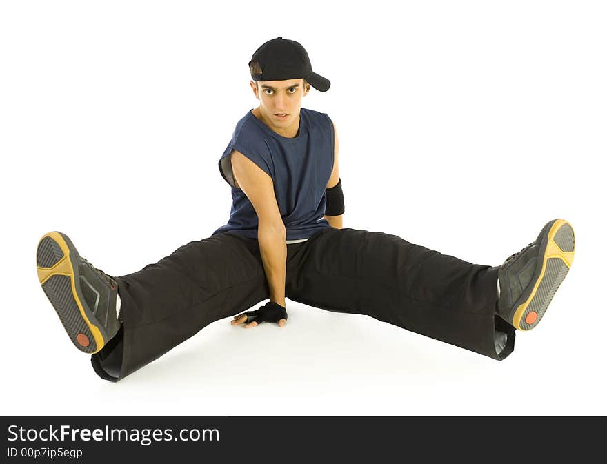 Young bboy holding up on hands. Holding legs in air. Looking at camera. Isolated on white in studio. Front view, whole body. Young bboy holding up on hands. Holding legs in air. Looking at camera. Isolated on white in studio. Front view, whole body