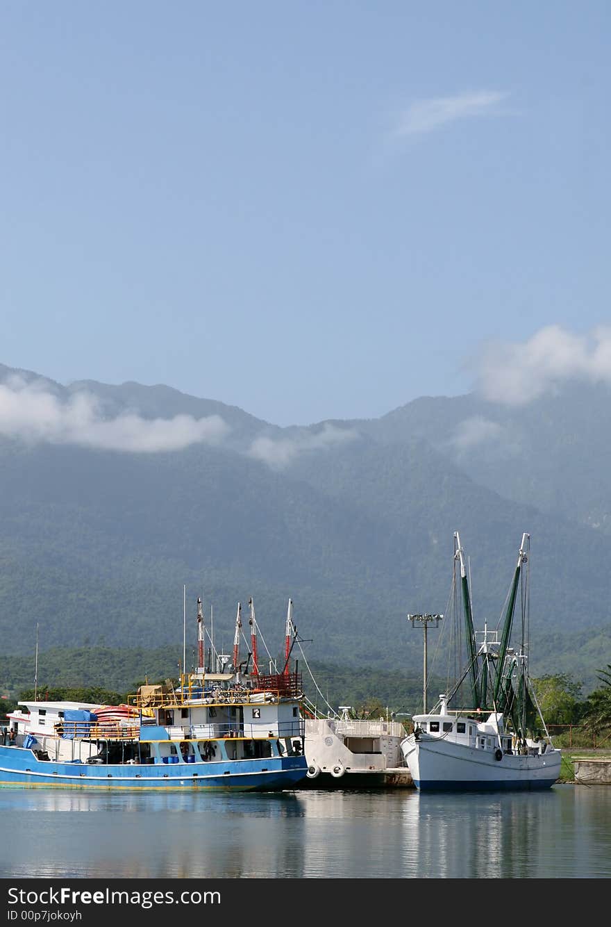 Fishing Boats in Port. Shot in Central America. Fishing Boats in Port. Shot in Central America