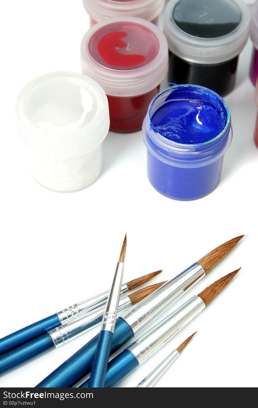 Set of new brushes and gouache paints, isolated on white