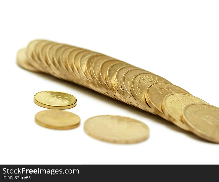 Coins pile on white background isolated change money