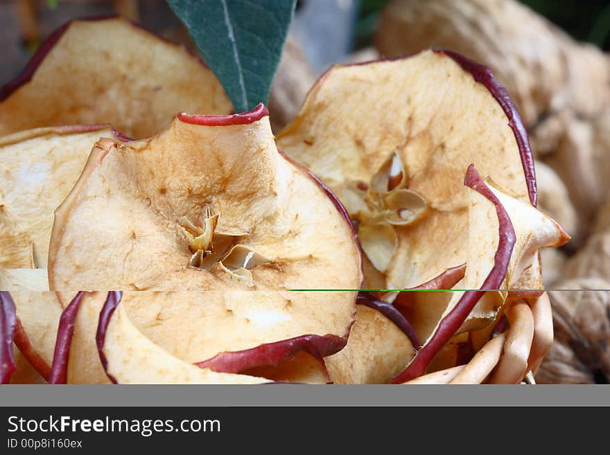 Close up of dried apples and walnuts