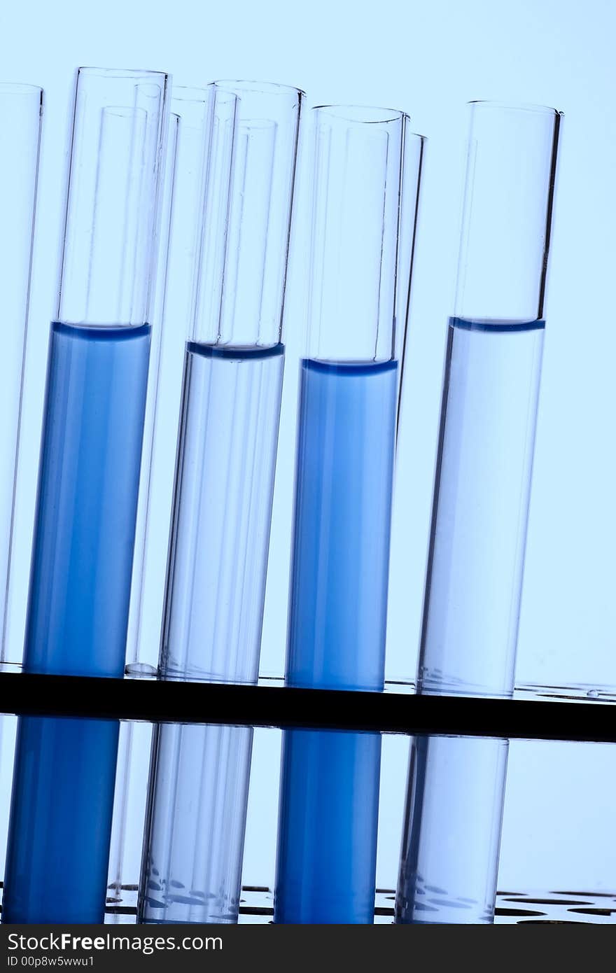 A bunch of test tubes in plain background.