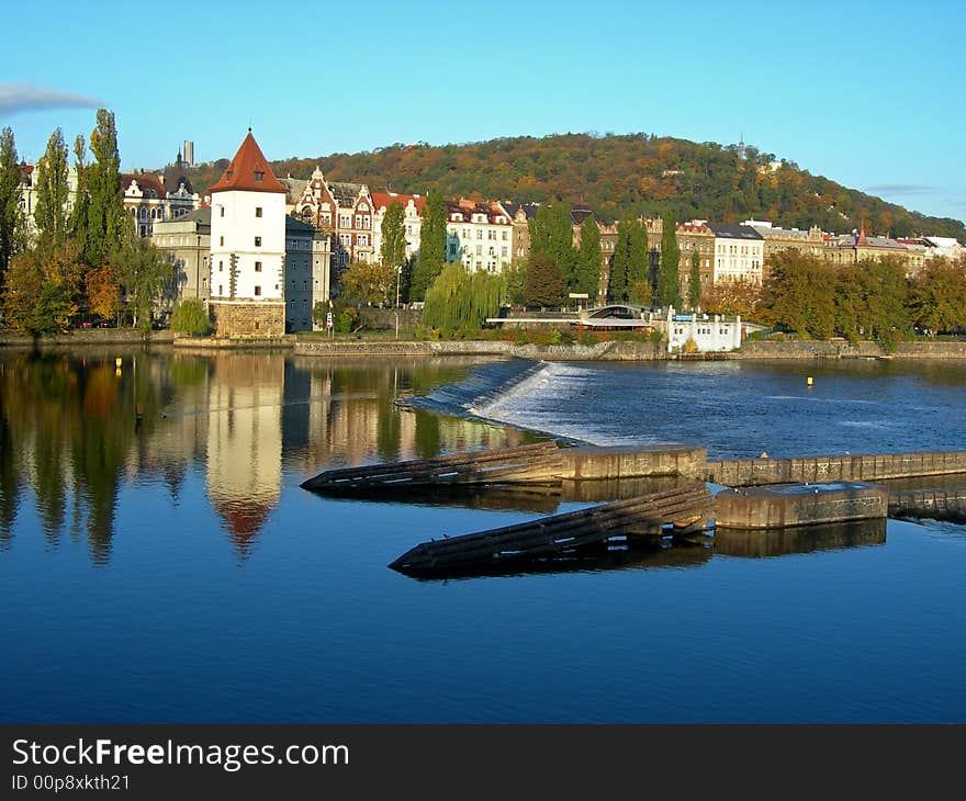 Panoramatic photo of the city of Prague with a view at Vltava River