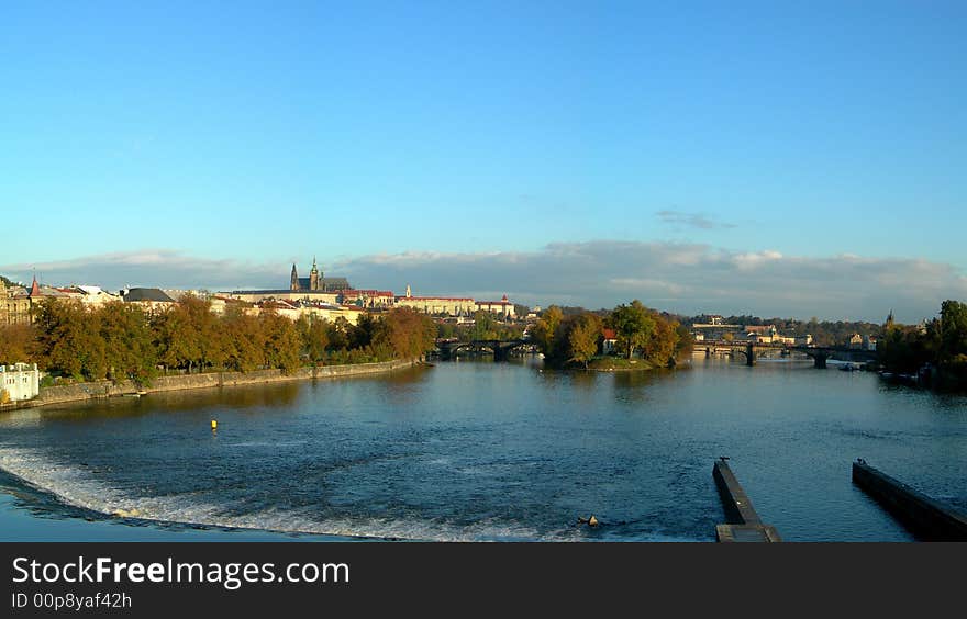 Panoramatic photo of the city of Prague with a view at Vltava River and Castle. Panoramatic photo of the city of Prague with a view at Vltava River and Castle
