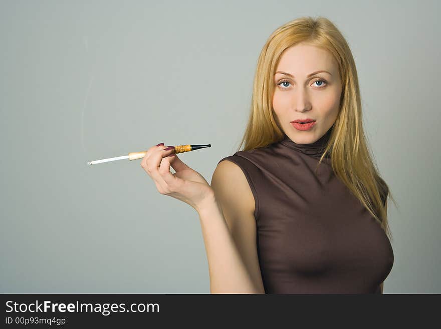 Blond Woman Hold Cigarette In Hand