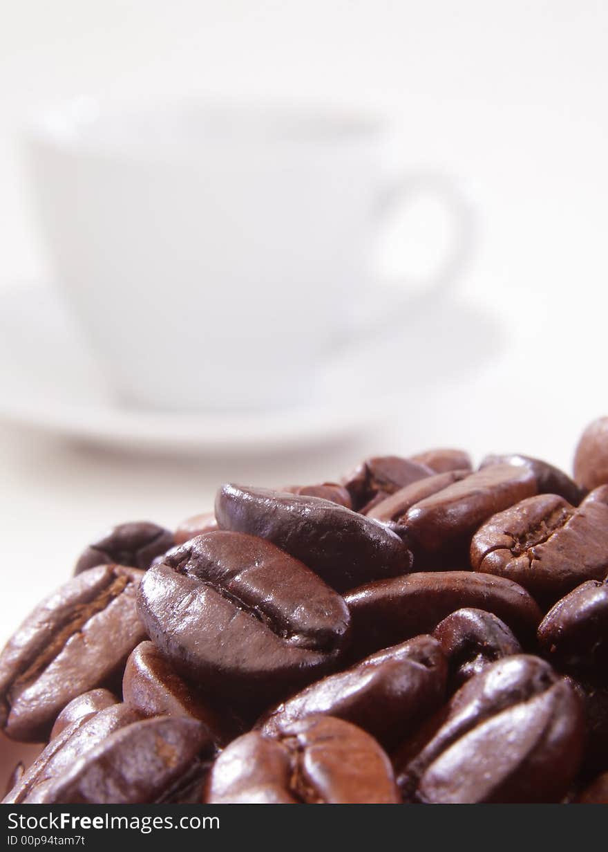 Coffee beans and cup