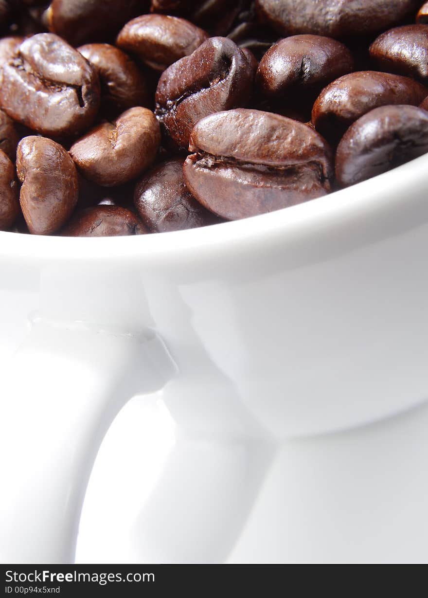 Cup of coffee beans.