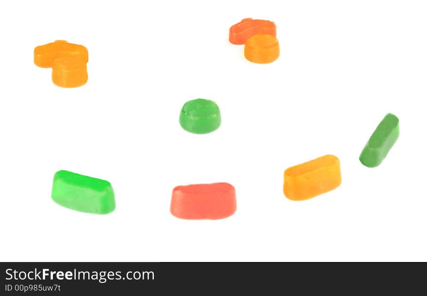 Coloured candy sweets isolated over a white background. Coloured candy sweets isolated over a white background