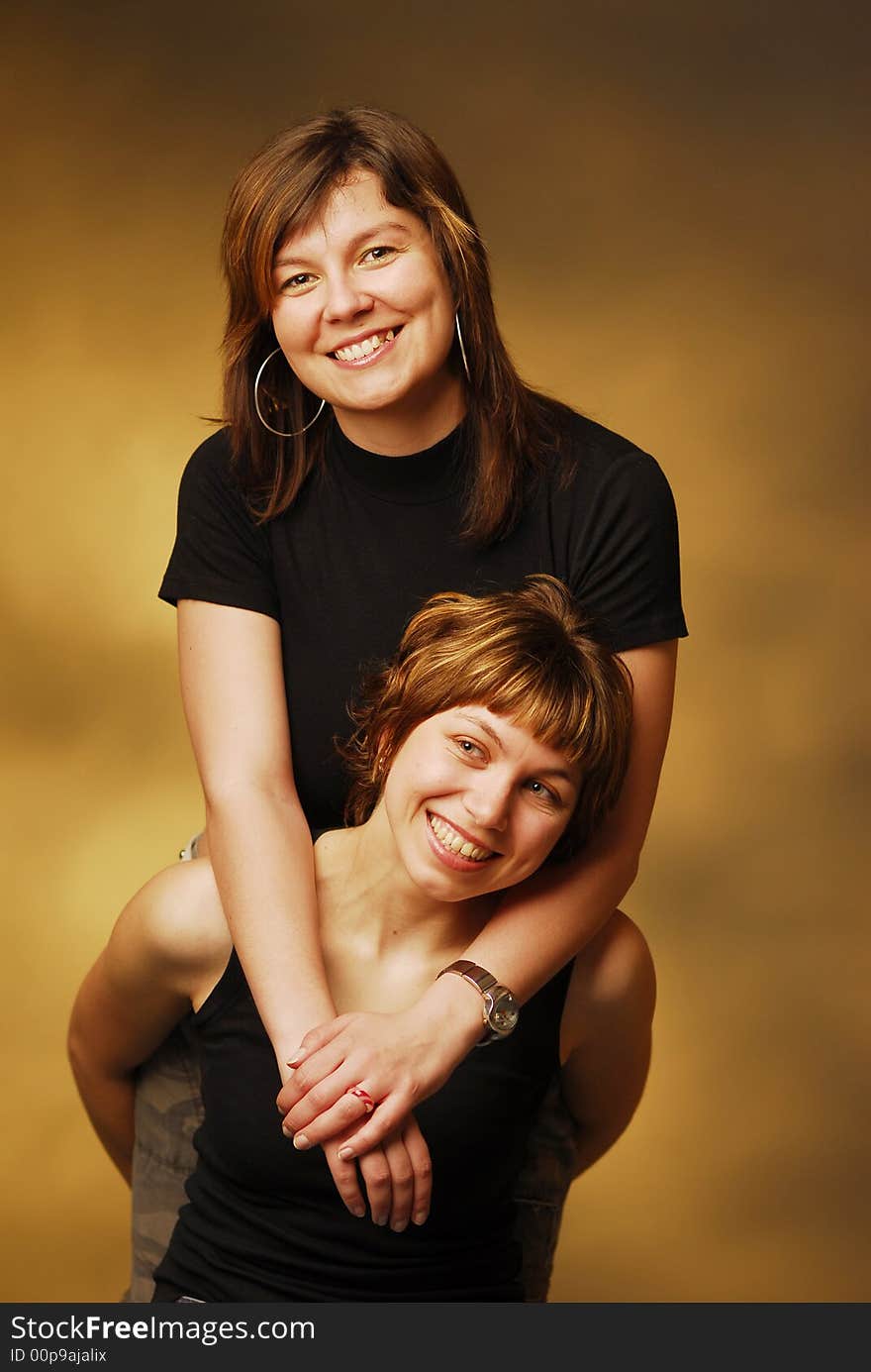 Smiling women over brown background. Smiling women over brown background