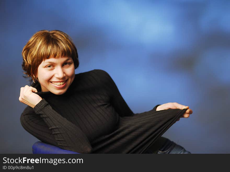 A portrait of woman over blue. A portrait of woman over blue