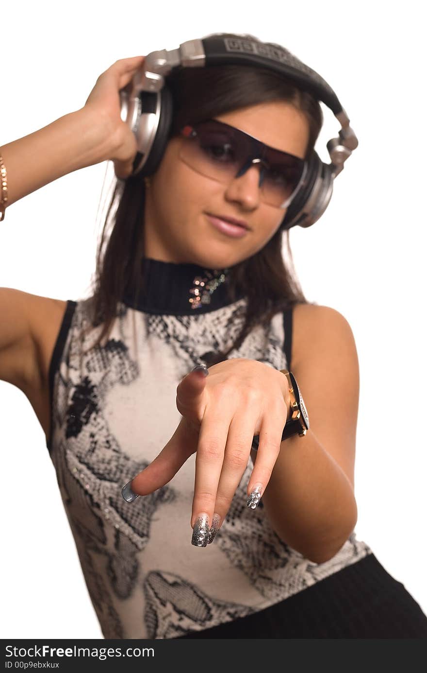 The beautiful girl with headphones on a white background. The beautiful girl with headphones on a white background