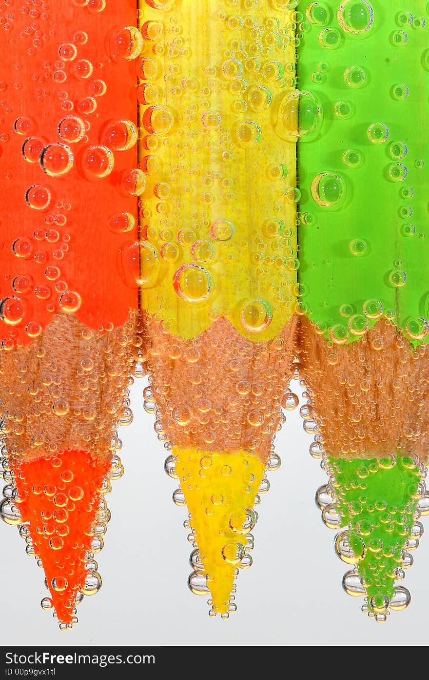 Colored crayons with bubbles