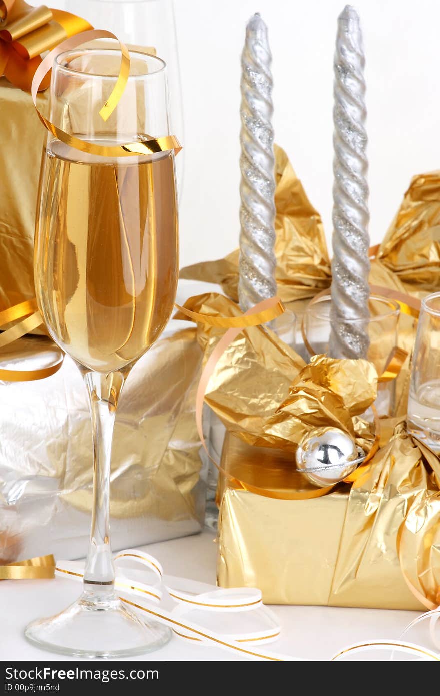 Glasses of champagne , gifts, celebration.