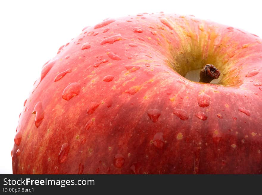 Macro red apple, with drops of water