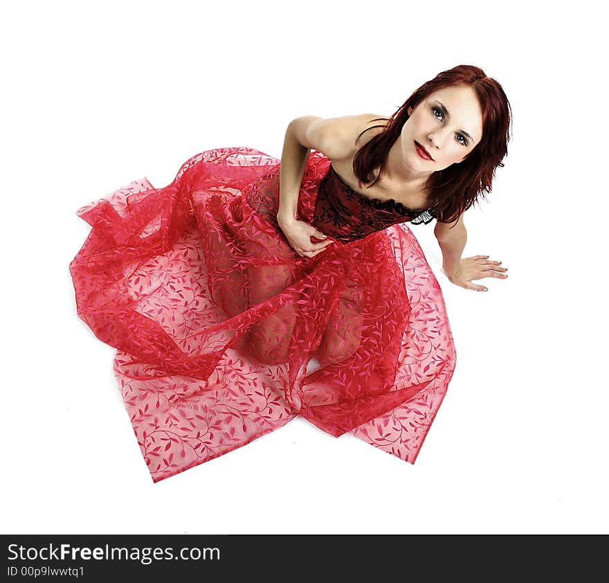 redhead girl in red dress isolated on white background. redhead girl in red dress isolated on white background