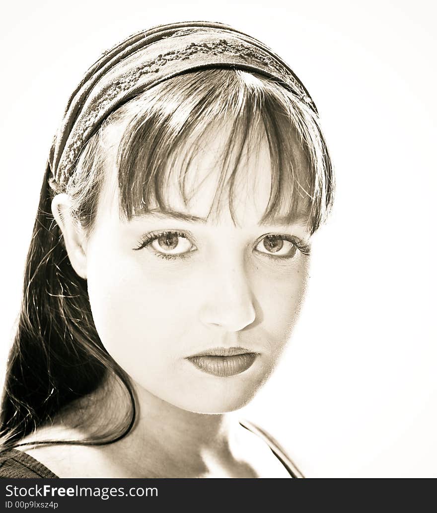 A young woman posing in the studio.