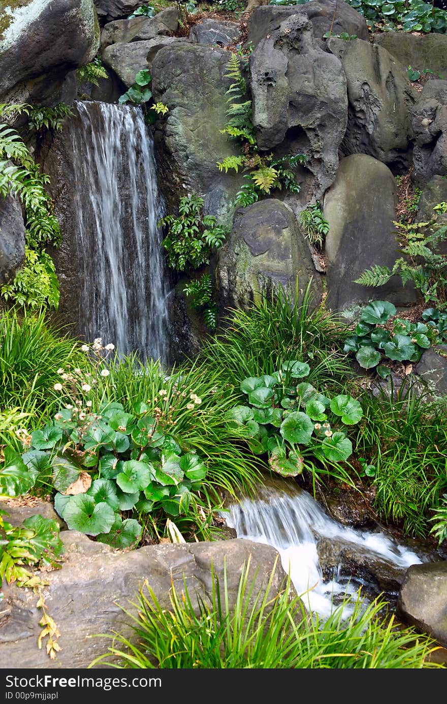 Waterfall In Japanese Garden