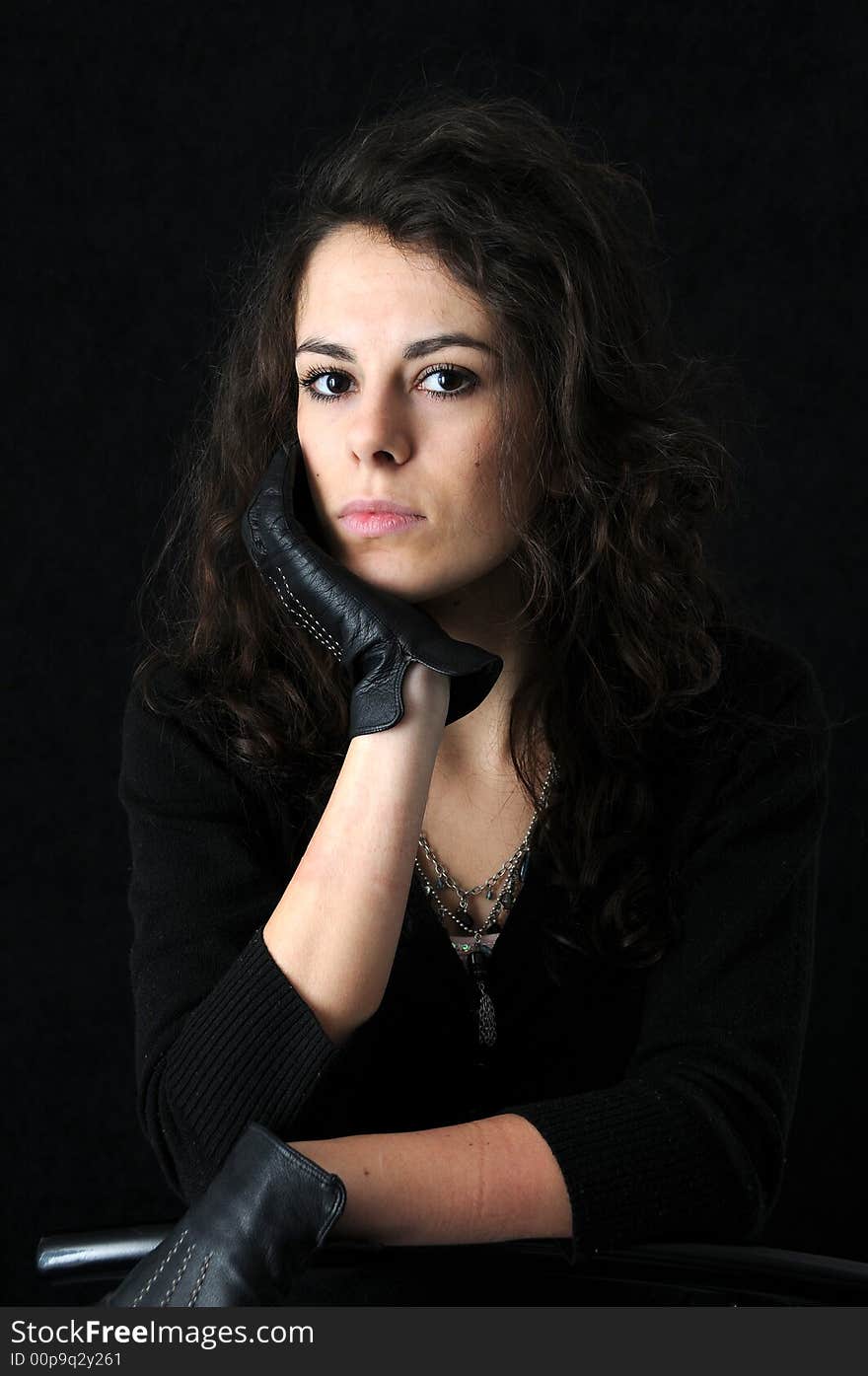 Beautiful brunette on black background