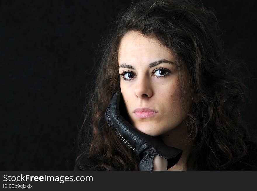 Beautiful brunette on black background