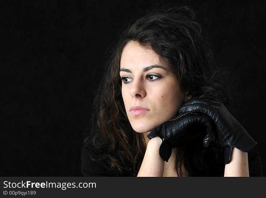 Beautiful brunette on black background