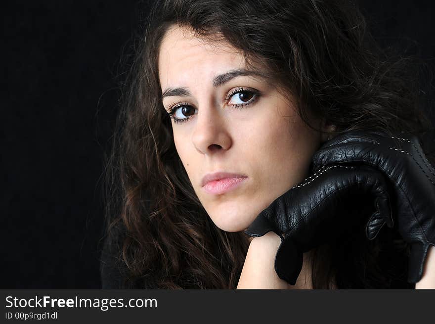 Beautiful brunette on black background