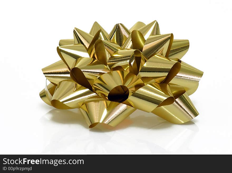 Golden Gift Bow on bright background